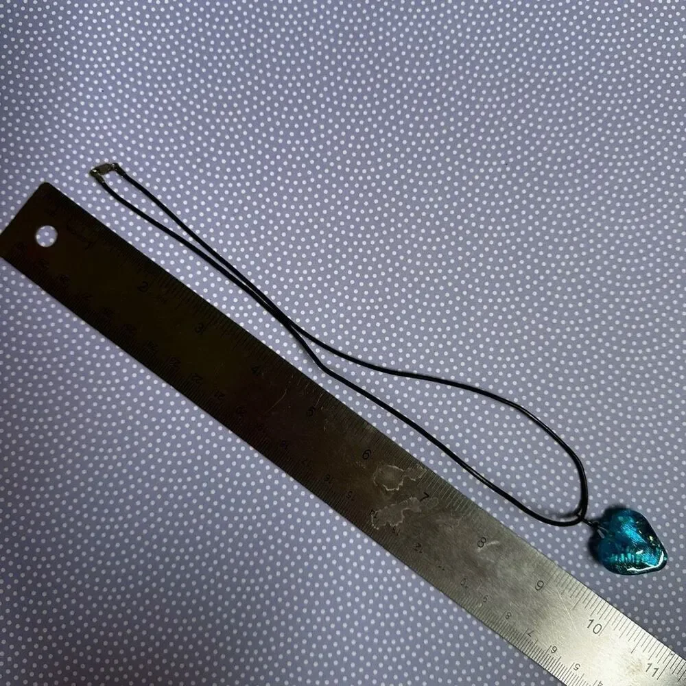 Blue glass heart pendant necklace sterling silver clasp on cord